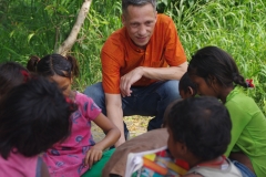 Classes being held at one of the slums in India where Charity United’s educational programs are in operation.