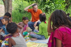 Classes being held at one of the slums in India where Charity United’s educational programs are in operation.