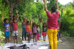 Classes being held at one of the slums in India where Charity United’s educational programs are in operation.