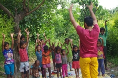 Classes being held at one of the slums in India where Charity United’s educational programs are in operation.