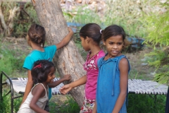 Classes being held at one of the slums in India where Charity United’s educational programs are in operation.