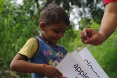 Classes being held at one of the slums in India where Charity United’s educational programs are in operation.