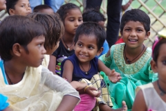 The community celebrates the new educational program that has been introduced to their village, at one of the slums in India where Charity United's educational programs are now in place.