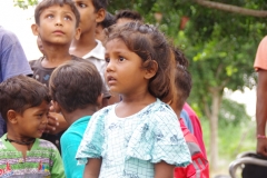 The community celebrates the new educational program that has been introduced to their village, at one of the slums in India where Charity United's educational programs are now in place.