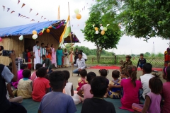 The community celebrates the new educational program that has been introduced to their village, at one of the slums in India where Charity United's educational programs are now in place.