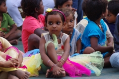 The community celebrates the new educational program that has been introduced to their village, at one of the slums in India where Charity United's educational programs are now in place.