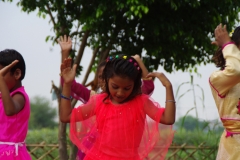 The community celebrates the new educational program that has been introduced to their village, at one of the slums in India where Charity United's educational programs are now in place.