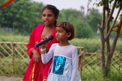 The community celebrates the new educational program that has been introduced to their village, at one of the slums in India where Charity United's educational programs are now in place.