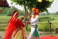 The community celebrates the new educational program that has been introduced to their village, at one of the slums in India where Charity United's educational programs are now in place.