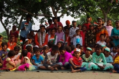 The community celebrates the new educational program that has been introduced to their village, at one of the slums in India where Charity United's educational programs are now in place.