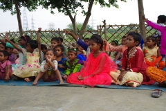 The community celebrates the new educational program that has been introduced to their village, at one of the slums in India where Charity United's educational programs are now in place.