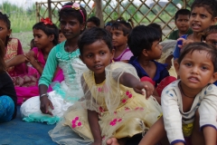 The community celebrates the new educational program that has been introduced to their village, at one of the slums in India where Charity United's educational programs are now in place.