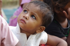 The community celebrates the new educational program that has been introduced to their village, at one of the slums in India where Charity United's educational programs are now in place.