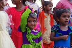 The community celebrates the new educational program that has been introduced to their village, at one of the slums in India where Charity United's educational programs are now in place.