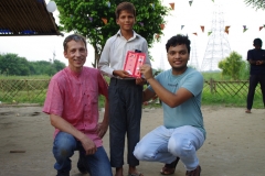 The community celebrates the new educational program that has been introduced to their village, at one of the slums in India where Charity United's educational programs are now in place.