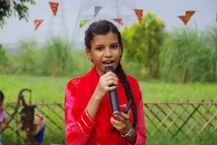 The community celebrates the new educational program that has been introduced to their village, at one of the slums in India where Charity United's educational programs are now in place.