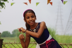 The community celebrates the new educational program that has been introduced to their village, at one of the slums in India where Charity United's educational programs are now in place.