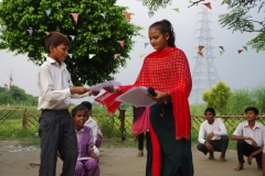 The community celebrates the new educational program that has been introduced to their village, at one of the slums in India where Charity United's educational programs are now in place.