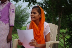 The community celebrates the new educational program that has been introduced to their village, at one of the slums in India where Charity United's educational programs are now in place.