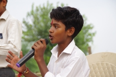 The community celebrates the new educational program that has been introduced to their village, at one of the slums in India where Charity United's educational programs are now in place.