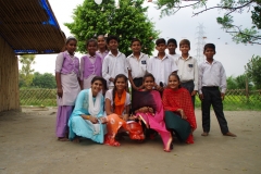 The community celebrates the new educational program that has been introduced to their village, at one of the slums in India where Charity United's educational programs are now in place.