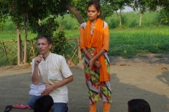 Children study English using the <i>Ollie the Elephant</i> books, at one of the slums in India where Charity United's educational programs are in operation.