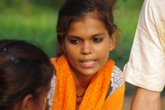 Children study English using the <i>Ollie the Elephant</i> books, at one of the slums in India where Charity United's educational programs are in operation.