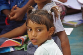 Classes being held at one of the slums in India where Charity United’s educational programs are in operation.